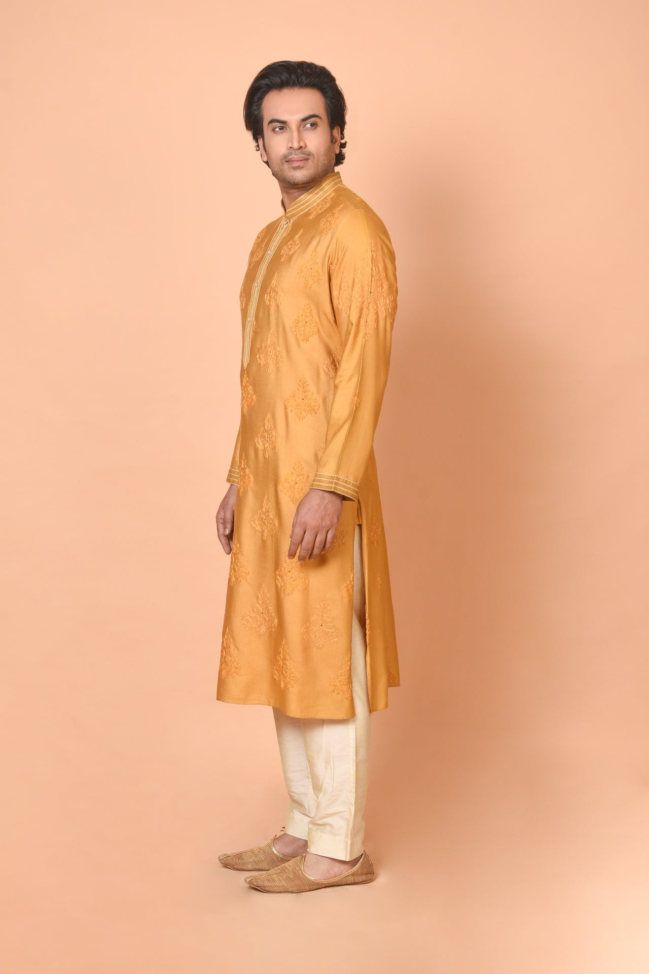 Yellow Ochre Cotton Silk Kurta with All-Over Machine Embroidery & Beige Churidar Set